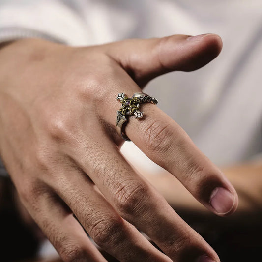 Judicator Blade ring worn on a hand in a close-up lifestyle photograph.
