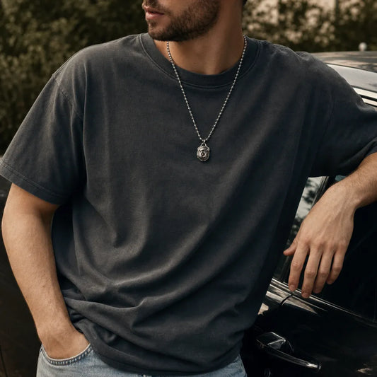 Man wearing the White Bronze Scarab Pendant
