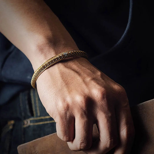 Model with Brass Dragon Scale Bracelet
