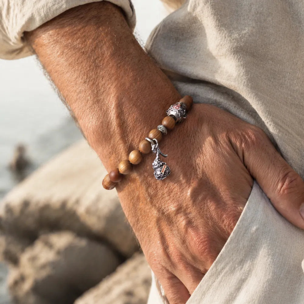 Trickster Gourd Charm On Wrist With Wood Bead Bracelet