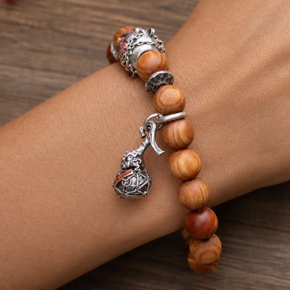 Trickster Gourd Charm Bead Bracelet Close Up