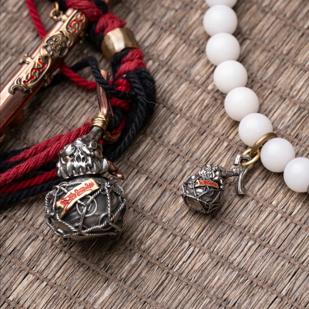 Trickster Gourd Charm With Cinnabar Beads Flat Lay