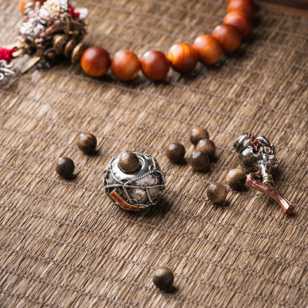 Trickster Gourd Pendant Cinnabar Capsule Flat Lay