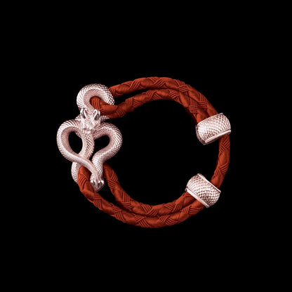 Demon Serpent Rope Bracelet 14K Rose Gold 4mm Braided Rope Deep Orange Black Background