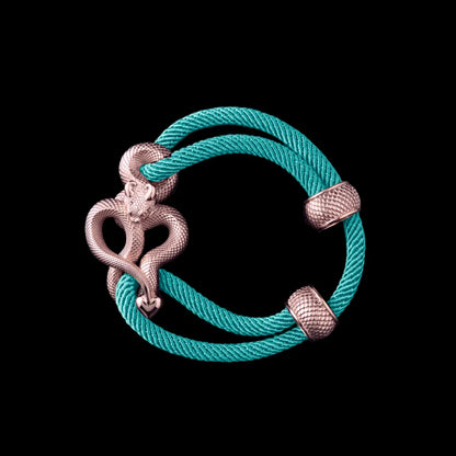 Demon Serpent Rope Bracelet 14K Rose Gold 4mm Milan Rope Light Blue Black Background