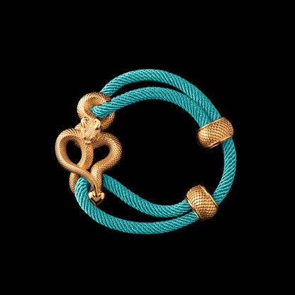Demon Serpent Rope Bracelet 18K GP 4mm Milan Rope Light Blue Black Background