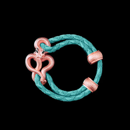 Demon Serpent Rope Bracelet 18K Rose Gold Plated Copper 18K White Gold Plated Silver 4mm Braided Rope Light Blue Black Background