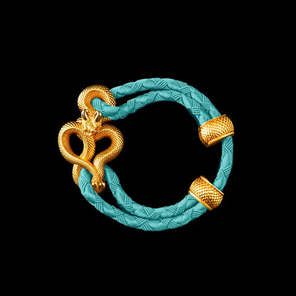 Demon Serpent Rope Bracelet 24K Gold 4mm Braided Rope Light Blue Black Background