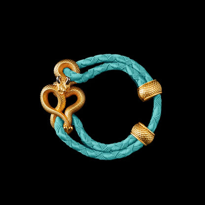 Demon Serpent Rope Bracelet 24K Gold Plated Brass 18K White Gold Plated Silver 4mm Braided Rope Light Blue Black Background