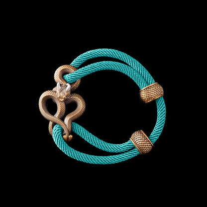 Demon Serpent Rope Bracelet Brass Ox Silver 4mm Milan Rope Light Blue Black Background