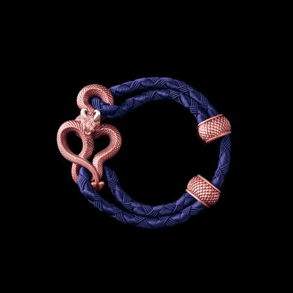 Demon Serpent Rope Bracelet Copper Oxidized Silver 4mm Braided Rope Vivid Blue Black Background