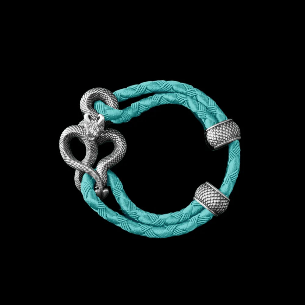 Demon Serpent Rope Bracelet Oxidized Silver 4mm Braided Rope Light Blue Black Background
