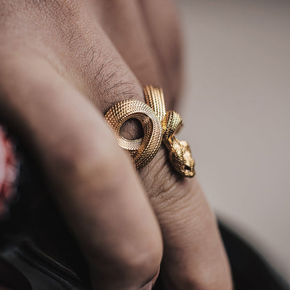 18K Gold Snake Ring on the finger