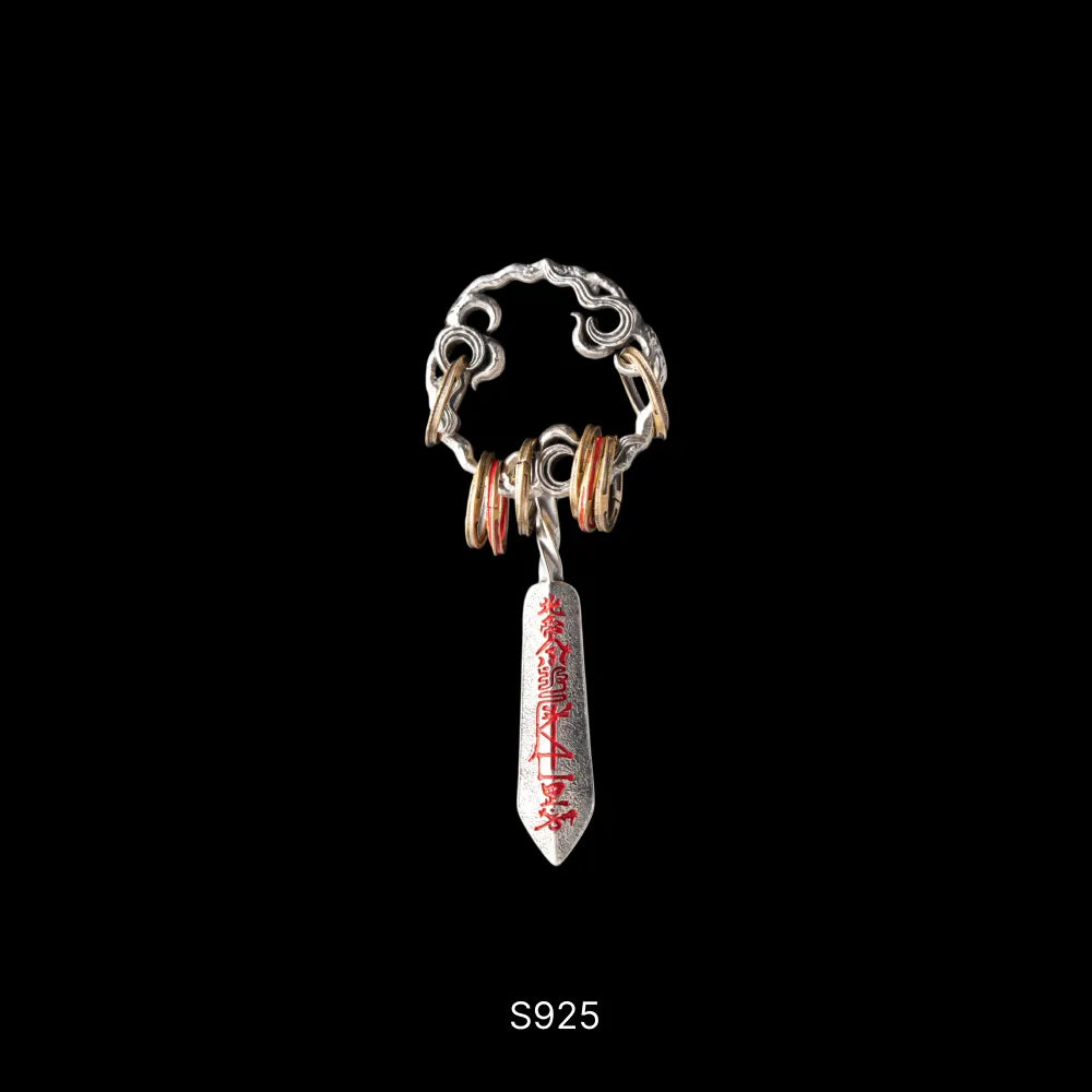 Masterblade Talisman Pendant oxidized silver brass and cinnabar black background product view