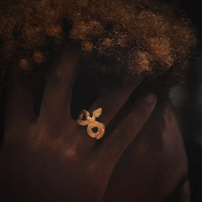 Model with 18K Gold Snake Cuff Ring 