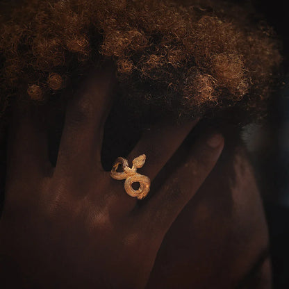 Model with 18K Gold Snake Cuff Ring 