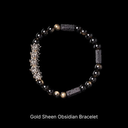 Serpent Spine Beaded Bracelet White Bronze And Brass Gold Sheen Obsidian Bracelet Black Background