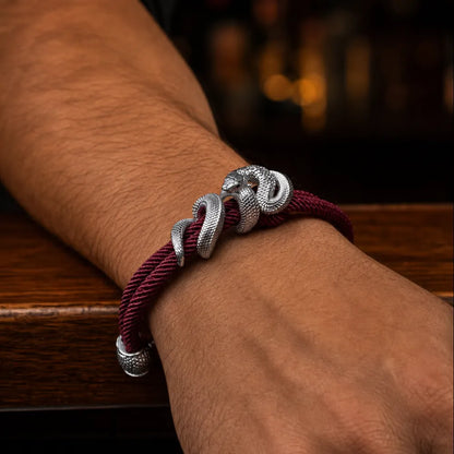 Black Mamba Rope Bracelet in 18K White Gold Plated White Bronze, worn on the wrist in a lifestyle close-up.