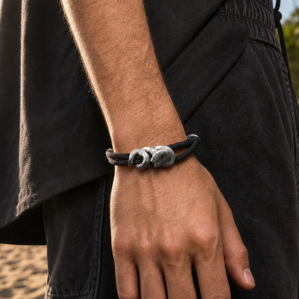 Black Mamba Rope Bracelet in 18K White Gold Plated White Bronze, worn on the wrist in a side view.