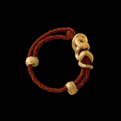 Black Mamba rope bracelet in 24K Gold Plated Brass with 4mm Braided Rope and & Deep Orange cord, black-background variant view
