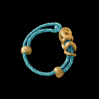 Black Mamba rope bracelet in 24K Gold Plated Brass with 4mm Braided Rope and & Light Blue cord, black-background variant view