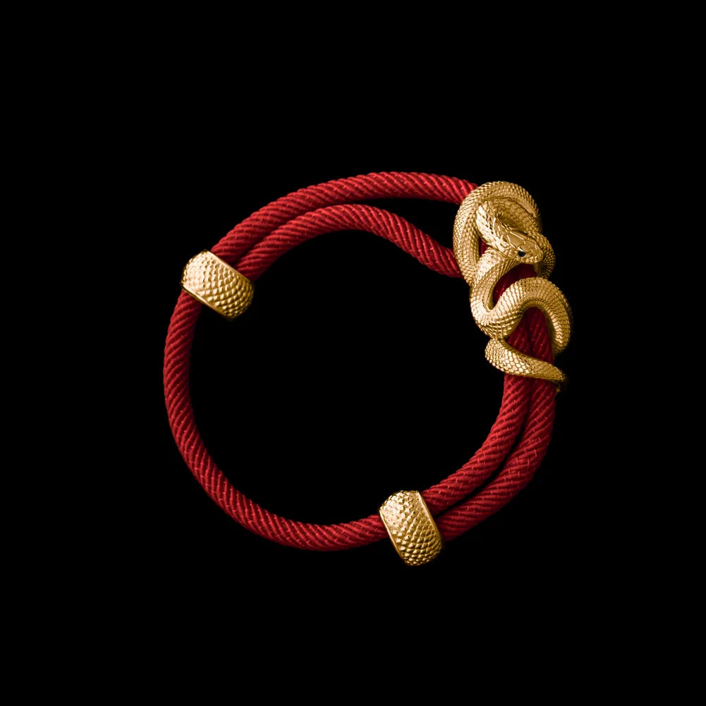 Black Mamba rope bracelet in 24K Gold Plated Brass with 4mm Milan Rope and Fiery Red cord, black-background variant view