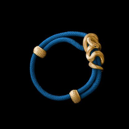 Black Mamba rope bracelet in 24K Gold Plated Brass with 4mm Milan Rope and Indigo cord, black-background variant view