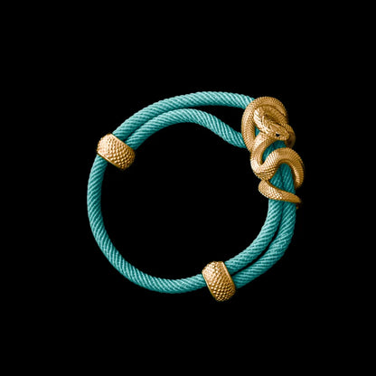 Black Mamba rope bracelet in 24K Gold Plated Brass with 4mm Milan Rope and Light Blue cord, black-background variant view