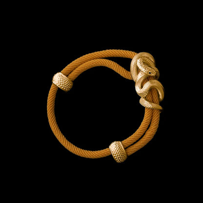 Black Mamba rope bracelet in 24K Gold Plated Brass with 4mm Milan Rope and Ochre cord, black-background variant view