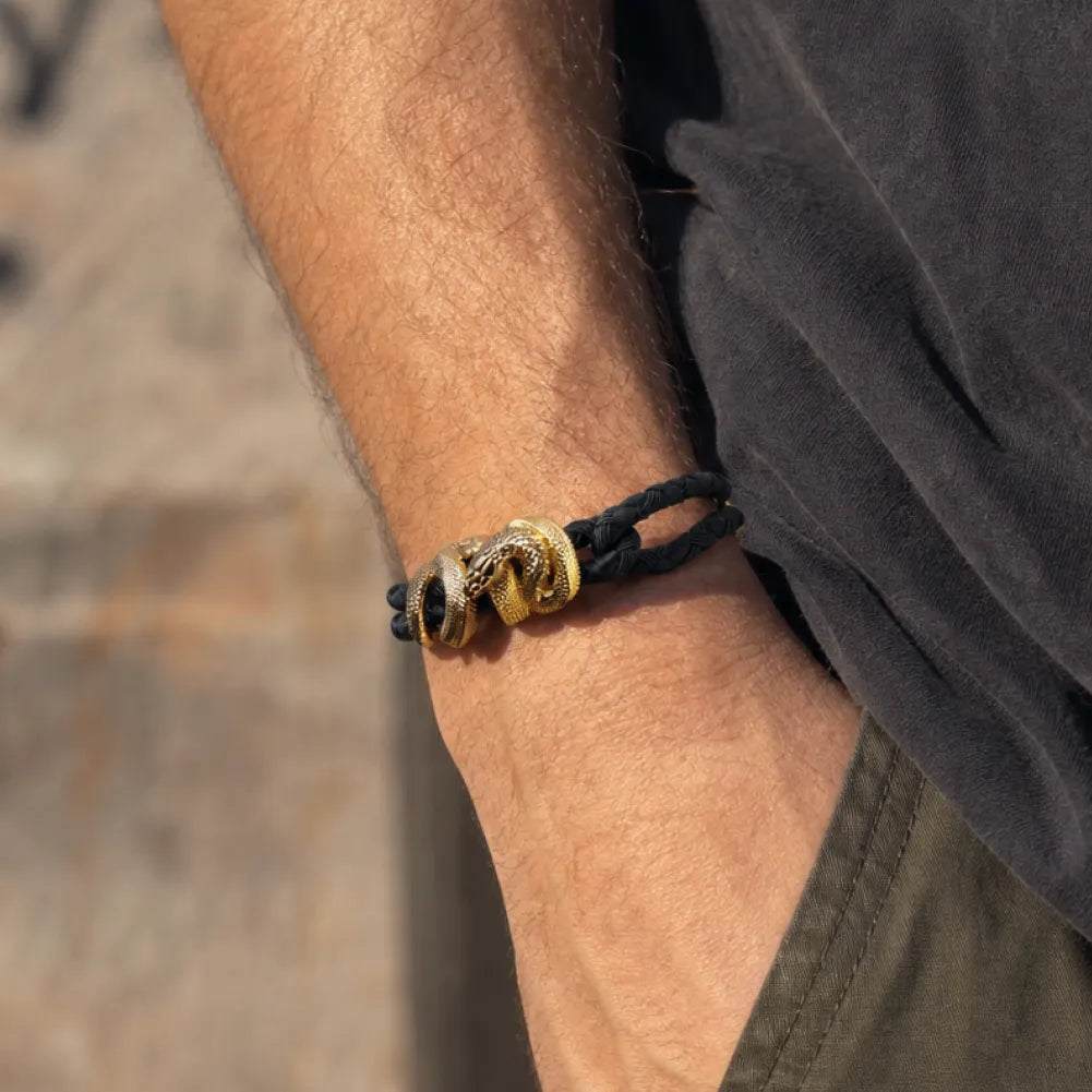 Black Mamba Rope Bracelet in 24K Gold Plated Brass, worn on the wrist in a front view.