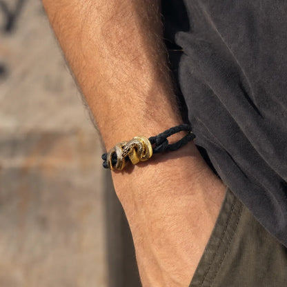 Black Mamba Rope Bracelet in 24K Gold Plated Brass, worn on the wrist in a front view.