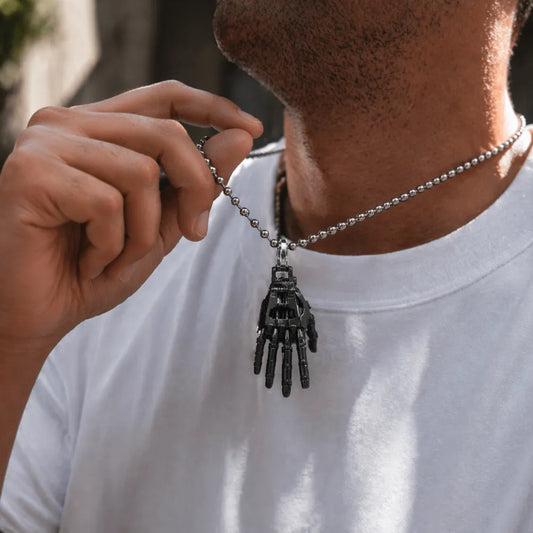 Blackened mechanical right hand pendant