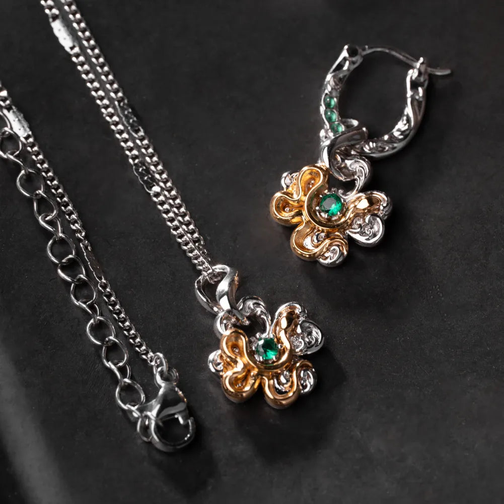 Clover serpent earring and side-body necklace styling options