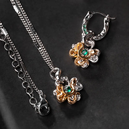 Clover serpent earring and side-body necklace styling options