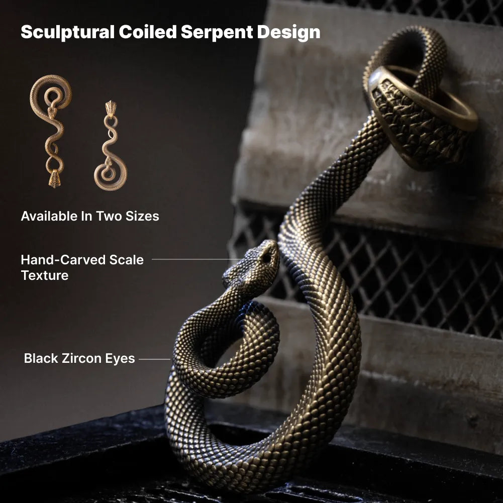 Sculptural coiled serpent pendant design in two sizes with black zircon eyes