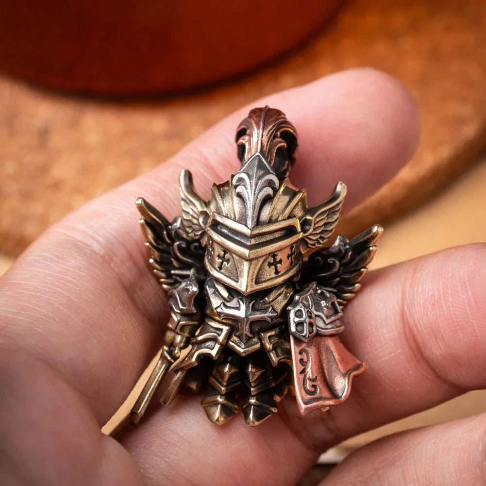 Tricolor Crimson Templar pendant held in hand showing articulated armor