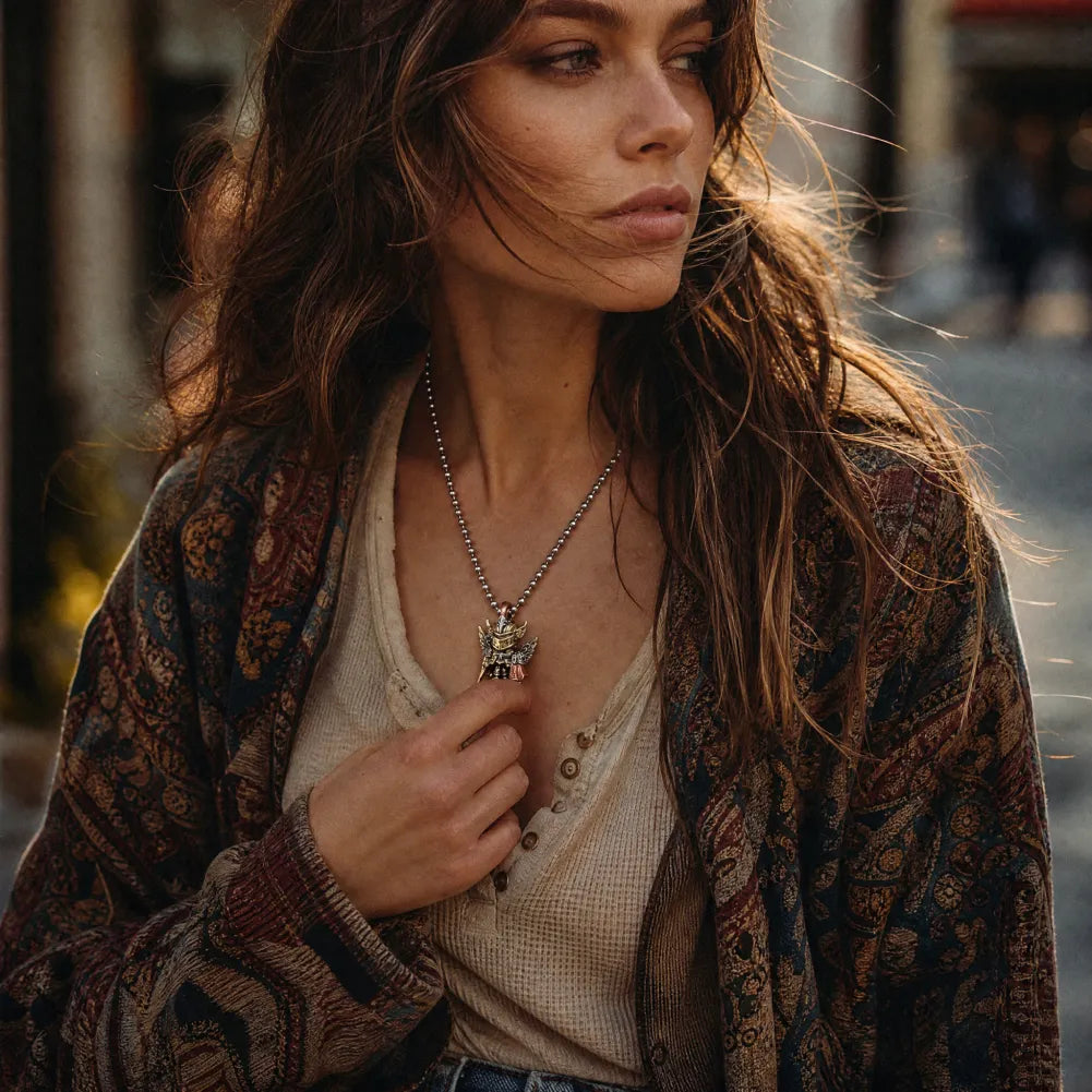 Tricolor Crimson Templar pendant styled with a womens brown outfit