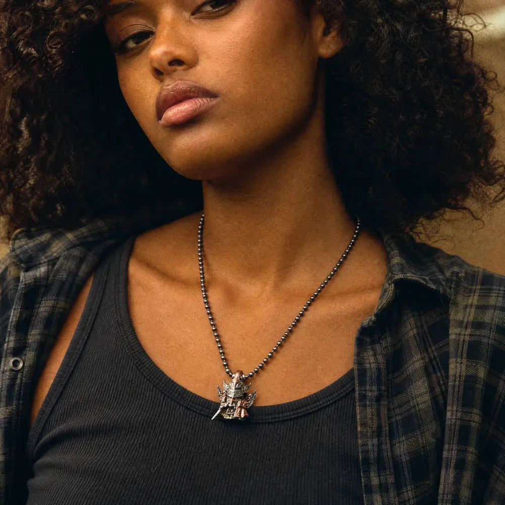 Crimson Templar pendant necklace styled with denim