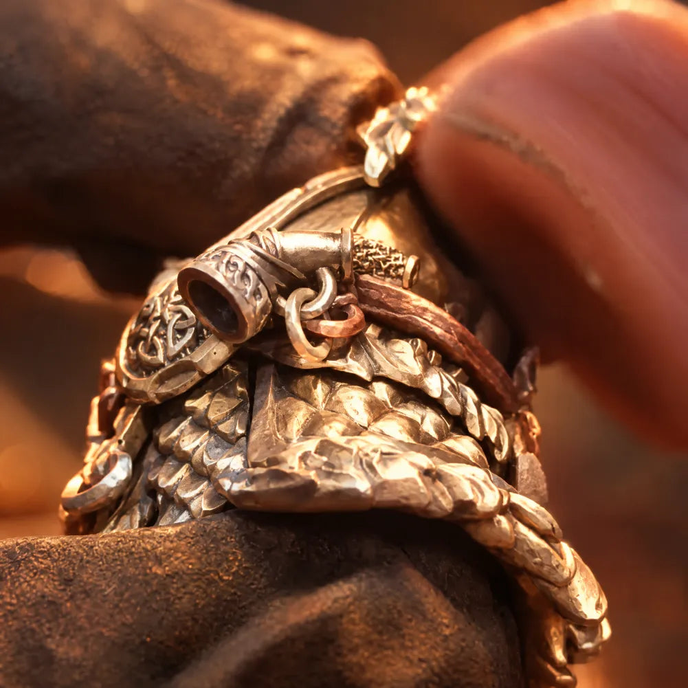 Hand-finishing the detailed armor of a Viking Raider magnetic figurine