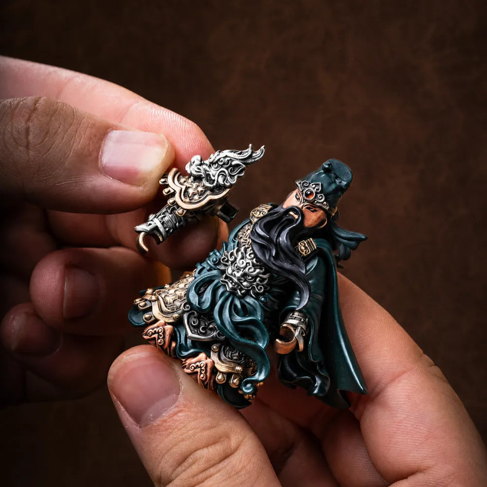 Guan Yu articulated figure held in hand for scale