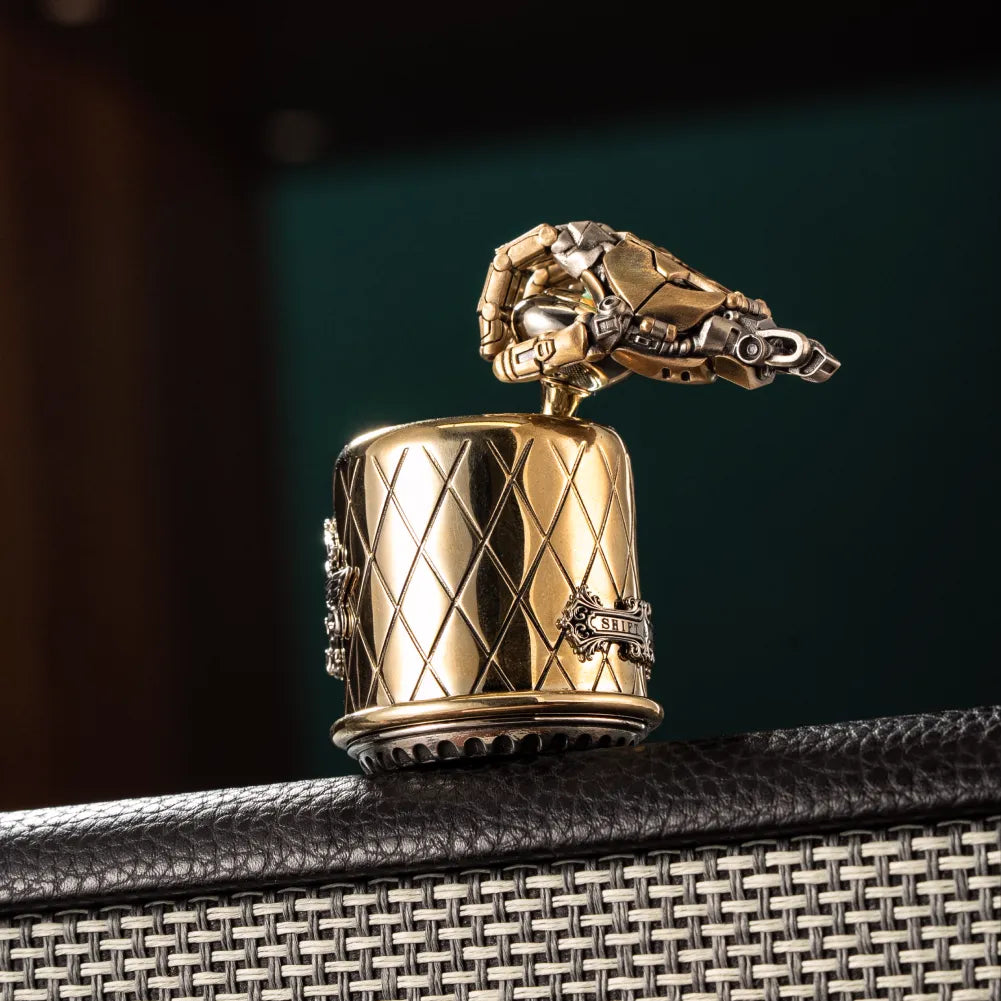Brass and white bronze gearshift fidget on a dark display stand