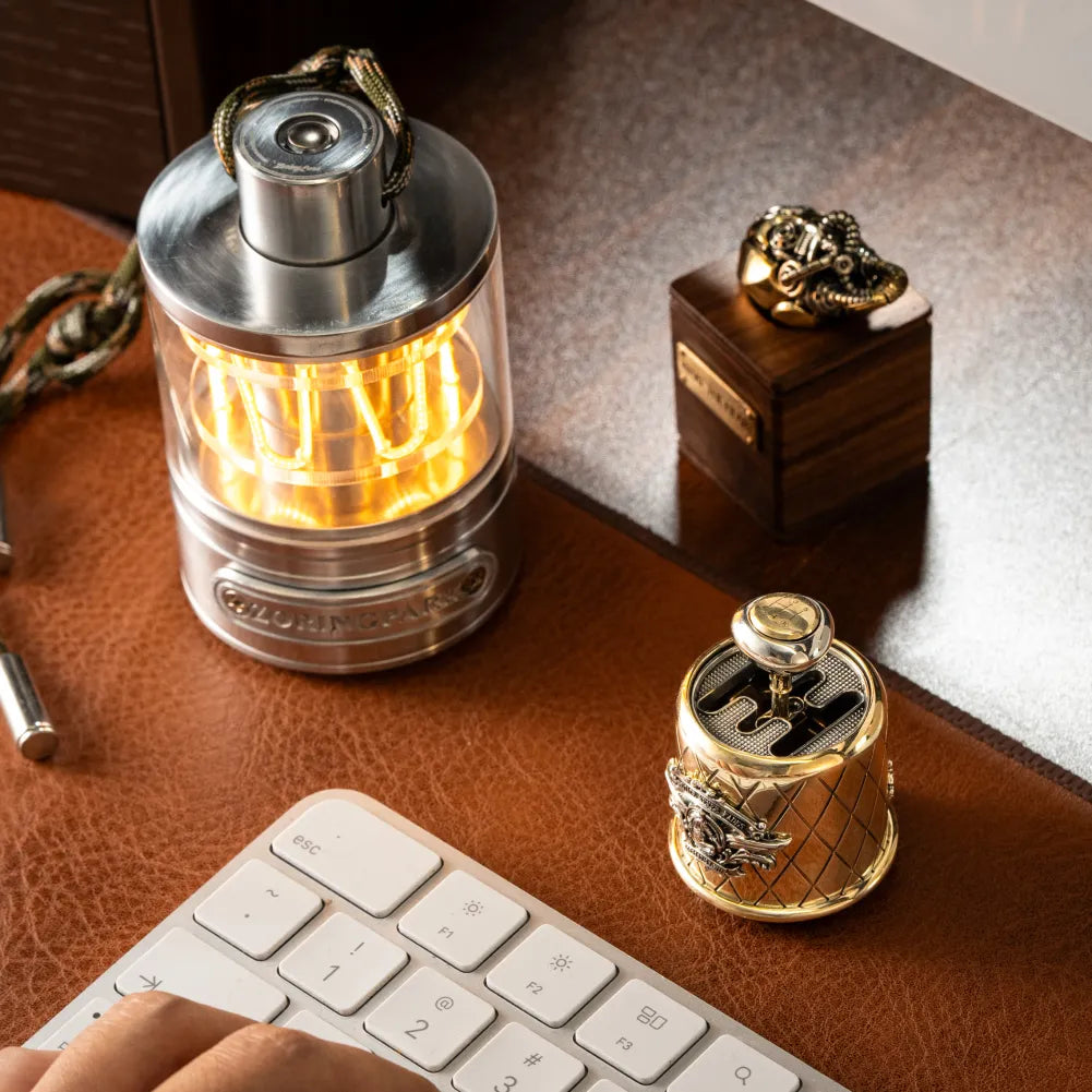 Gearshift fidget displayed beside a keyboard and wooden box