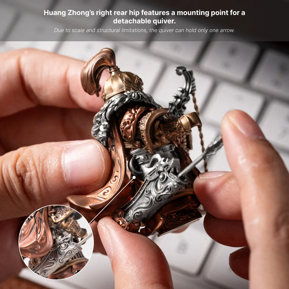 Hands turning the Huang Zhong figure to show the detachable quiver mounting point on the right rear hip