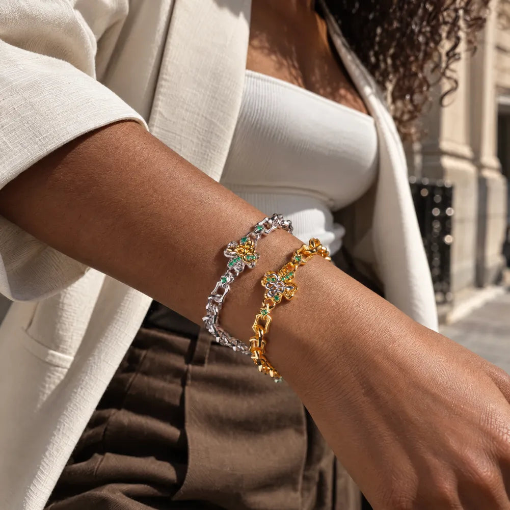 Model wearing the gold-tone Lucky Clover Snake Bracelet