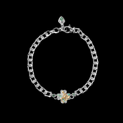 Silver-tone Lucky Clover Snake Bracelet on a black background