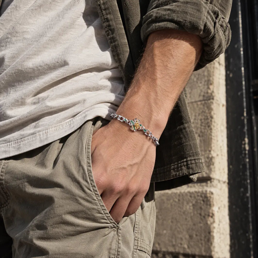 Silver-tone Lucky Clover Snake Bracelet worn on the wrist