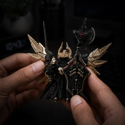 Blackened and Bronze Mech Justicar articulated wings shown in hand