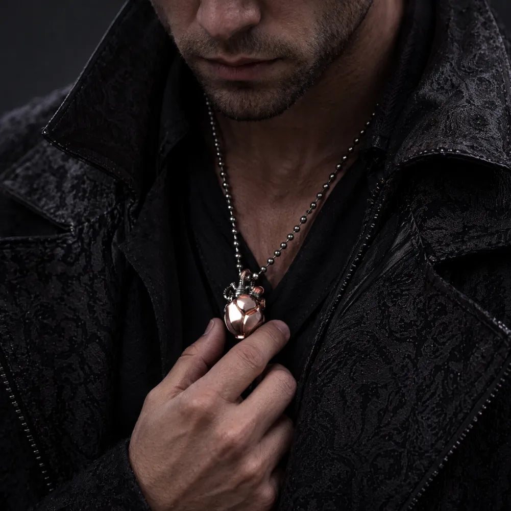 Copper & White Bronze Mechanical Heart Pendant worn in a men's lifestyle scene