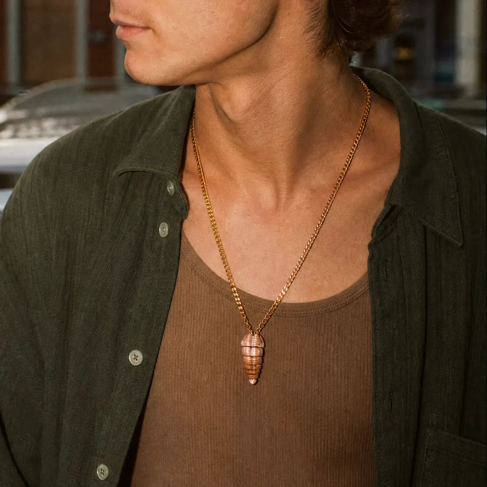 Mimicling Chest Pendant necklace styled with a green shirt