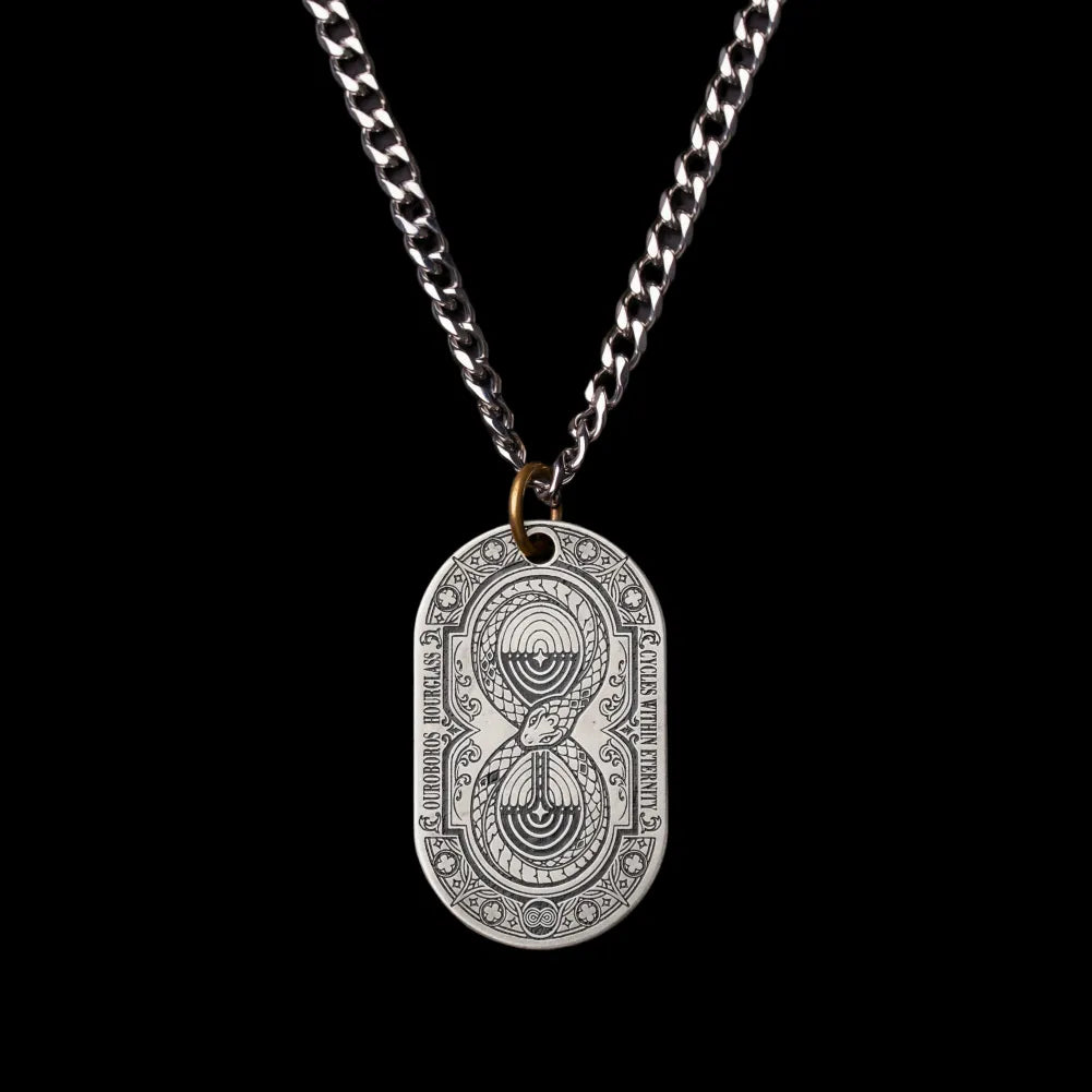 Ouroboros Hourglass Tag SKU image 1 in silver-tone finish; attachment examples are not included